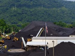 Mounds of coal are piled high awaiting shipment at a coal company terminal in West Virginia